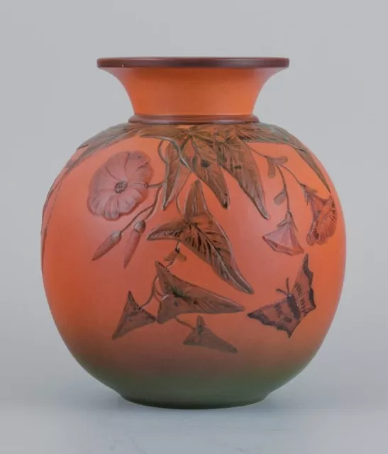 Ipsens, Denmark, vase with flowers and butterfly.