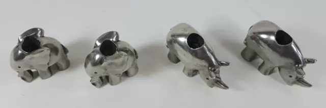 Miniature Solid Steel Elephants and Rhinoceros Candle Holders. 4 Figures.