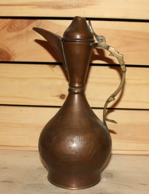 Vintage Islamic hand made engraved copper pitcher teapot with spout