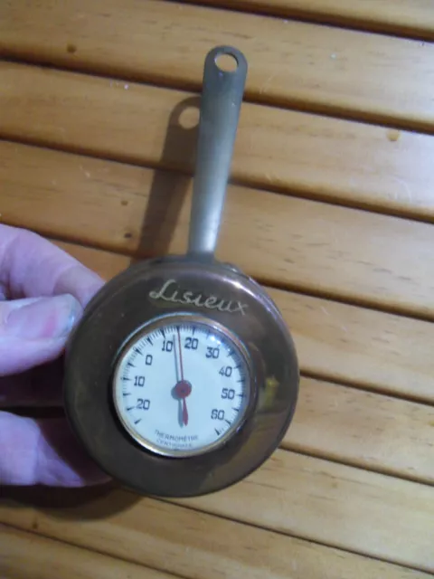 https://www.picclickimg.com/tdIAAOSwsw1h8uEv/vintage-thermometer-thermometre-mural-sur-support-poele-en.webp