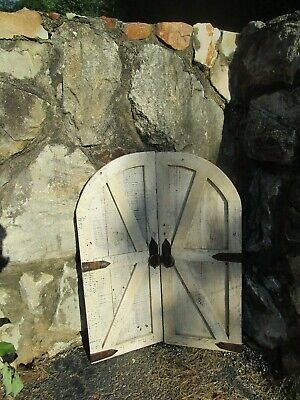 Pair of vintage inspired round top barn doors/shutters with hardware wall decor