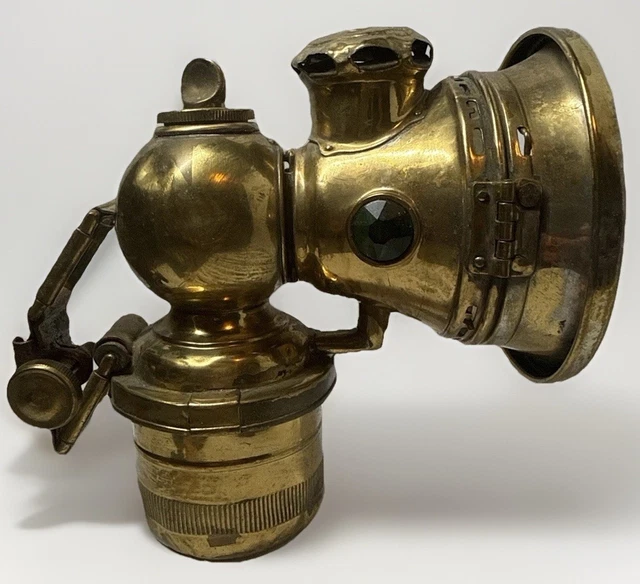 What is the history and usage of a Motorcycle Bike Riemanns Carbide Lamp Phenomenon