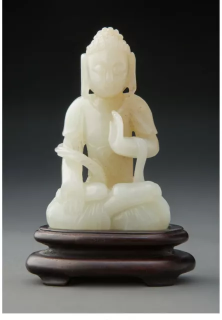 A123 A Chinese White Jade Carved Buddha, 19th/20th century