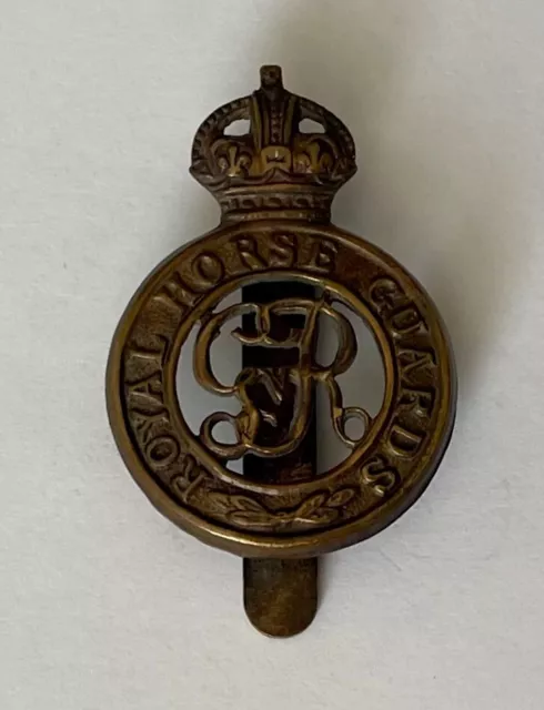 The Royal Horse Guards (GR V) Military cap badge.