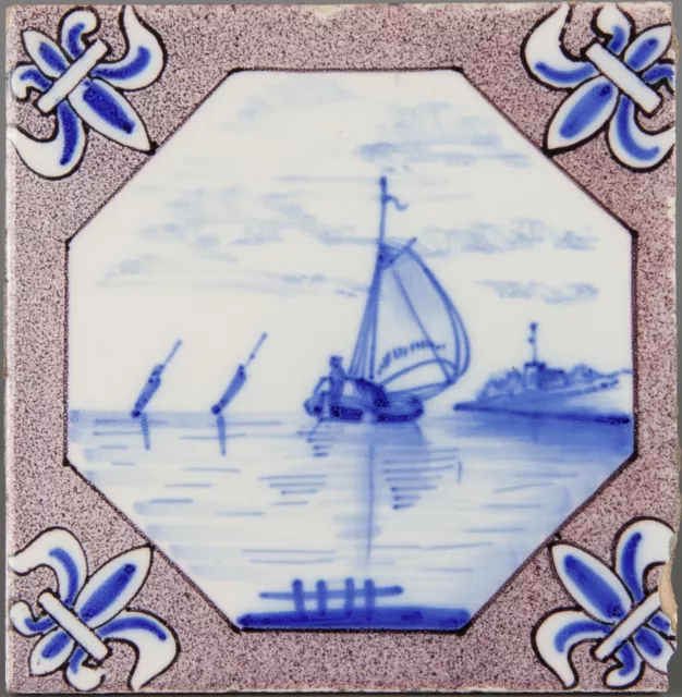 Nice Dutch Delft manganese & blue tile, landscape with boats, circa 1900.