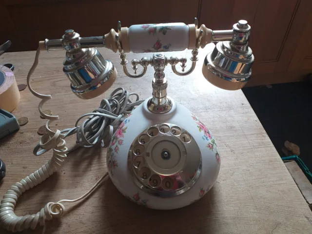 A Royal Albert Telephone, Moss Rose Pattern, With a Rotary Dial. This Telephone