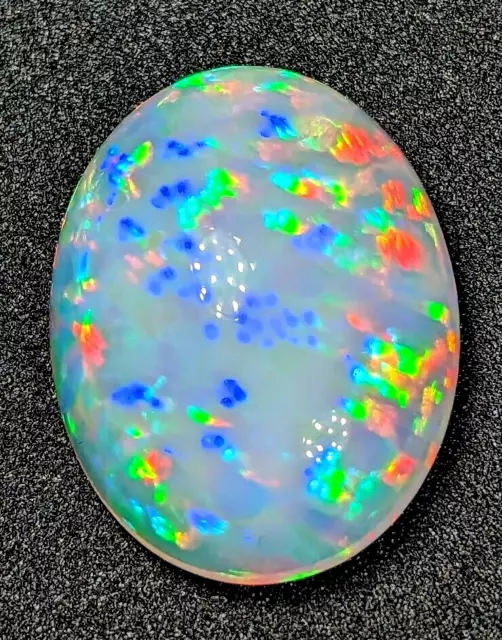 25.4ct Welo Opal Oval Cabochon AAAA Loose Prism Flash Ethiopian VIDEO