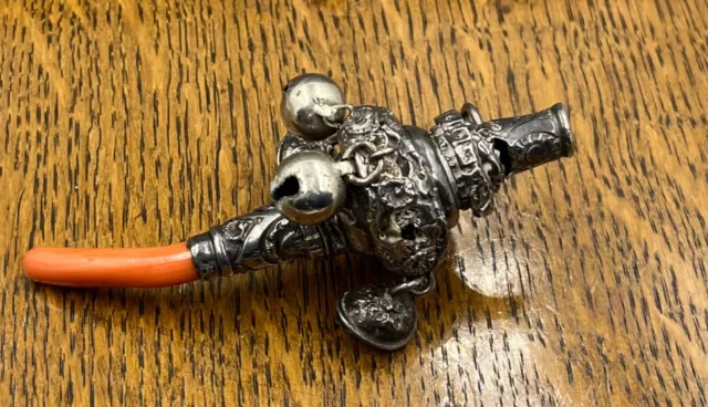 English sterling silver Victorian childs rattle with coral handle Birm 1880