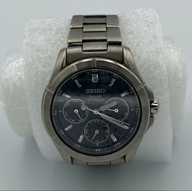 SEIKO V14J-0AE0 SOLAR Titanium Mens Watch with Navy Dial
