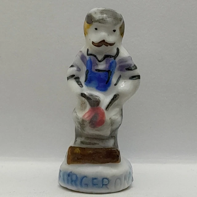 Fève en porcelaine Forgeron Nordia (B21M)