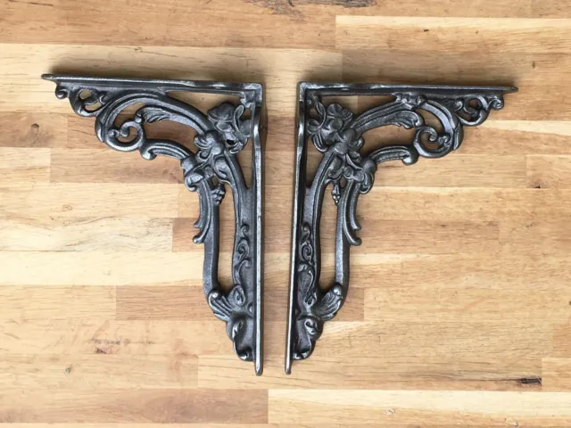 A pair of lovely cast iron Victorian style foliage shelf brackets shelving