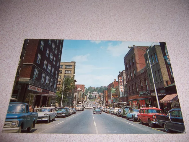 1960s MAIN STREET SCENE, DOWNTOWN MORGANTOWN WV. VTG POSTCARD