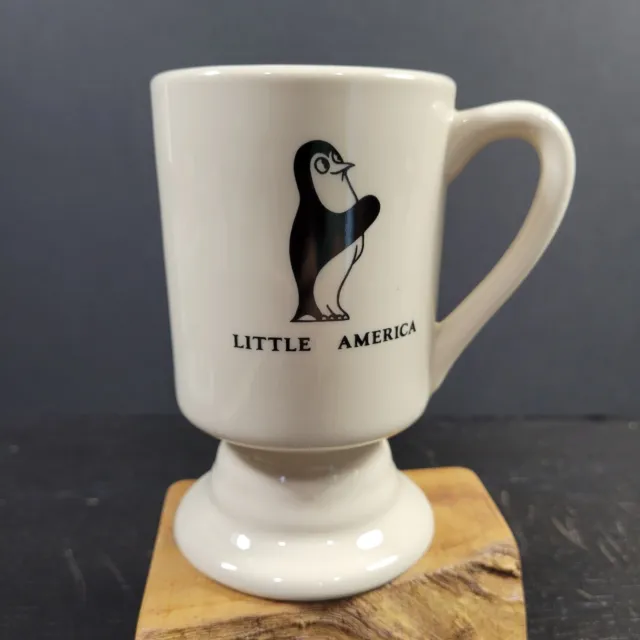 Taza de café de cerámica vintage con logotipo de Little America Hotel Penguin