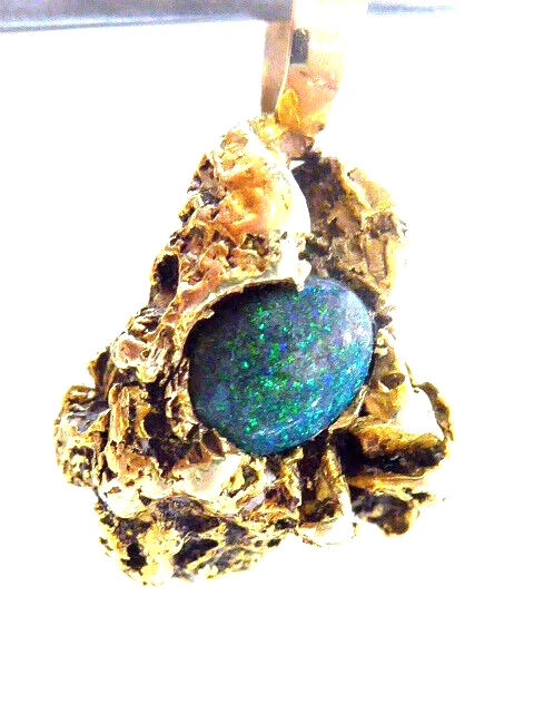 Large Natural Gold Nugget With A Genuine Australian Black Opal Pendant 9 Grams. Large Natural Gold Nugget With A Genuine Australian Black Opal Pendant 9 Grams.