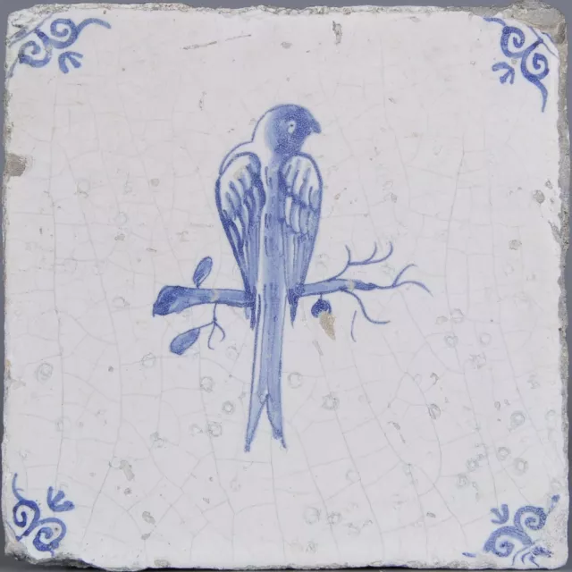Nice Dutch Delft Blue tile, bird on branch, mid 17th century.