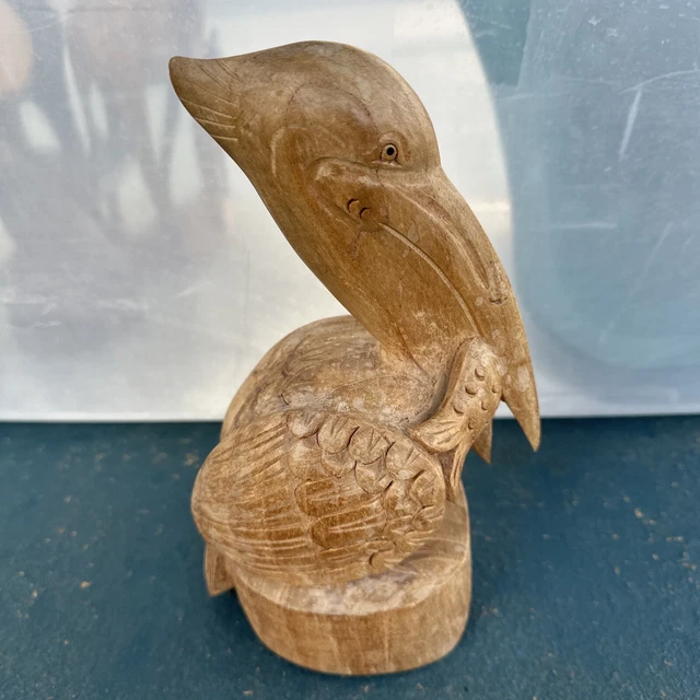 Hand carved 9” Wooden Pelican With Fish In The Mouth Preowned