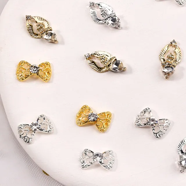 10 piezas de aleación arco arte en uñas decoraciones 3D uñas dijes diamantes de imitación joyería en uñas F3