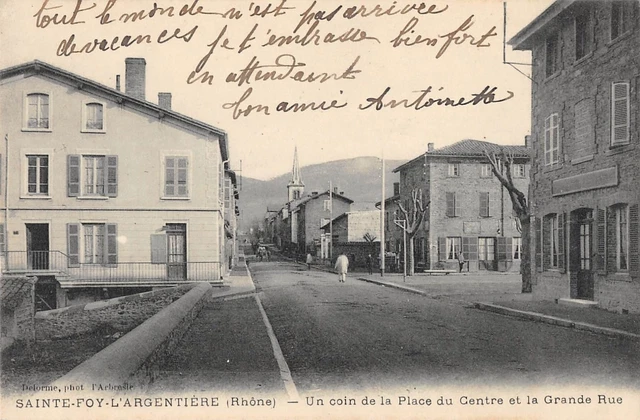 Cpa 69 Sainte Foy L'argentiere Un Coin De La Place Du Centre Et La Grande Rue