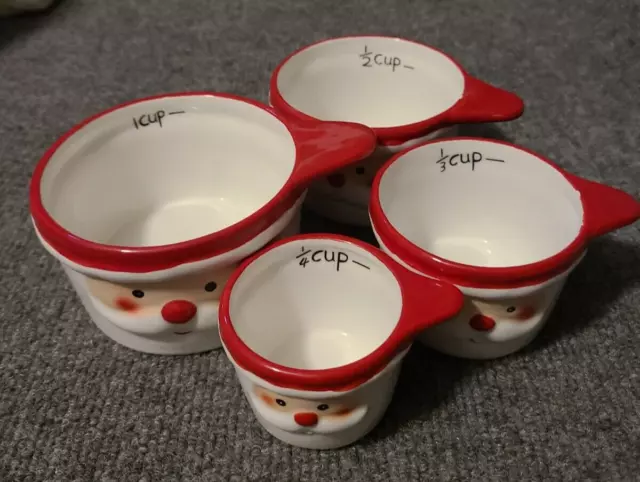https://www.picclickimg.com/tnsAAOSwBxtlkKiF/Ceramic-Santa-Claus-Face-Measuring-Cups-Set-Of.webp