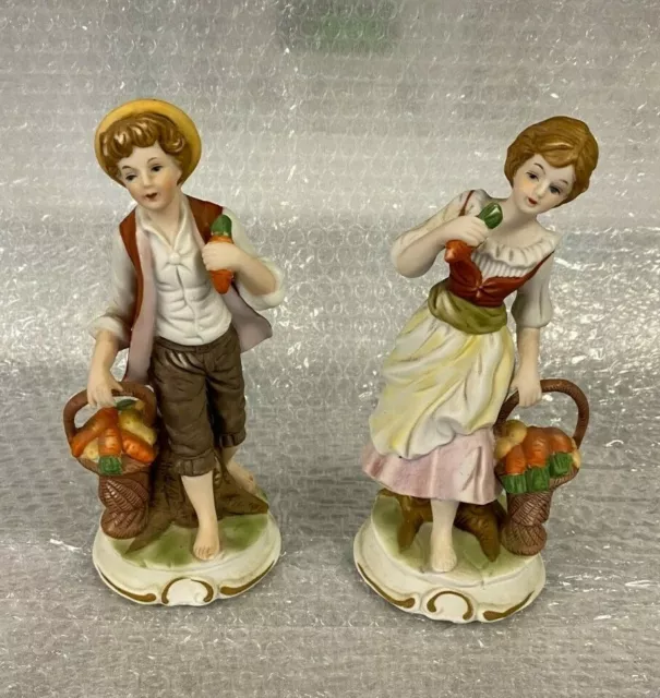 A pair of Vintage Ceramic Farm Boy & Girl Figurines 8" Tall