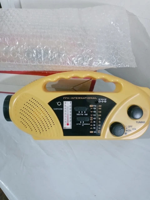 FFH International Self Powered AM/FM Radio Solar & Crank Solar Yellow NIB