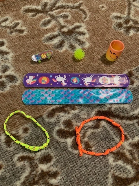 Retro 90s Era Memorabilia Mini Toys Slinky Slap Bracelet Skateboard Party Favors