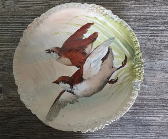 beautiful hand painted french porcelain wall hanging plate.