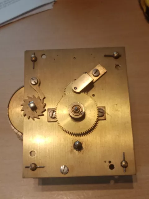 Astral English fusee dial clock movement and pendulum.