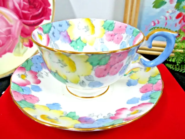 Crown staffordshire tea cup and saucer painted chintz floral pastel teacup blue