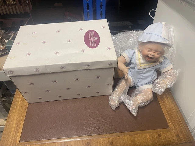 Porcelain ashton drake galleries baby doll with box looks unused