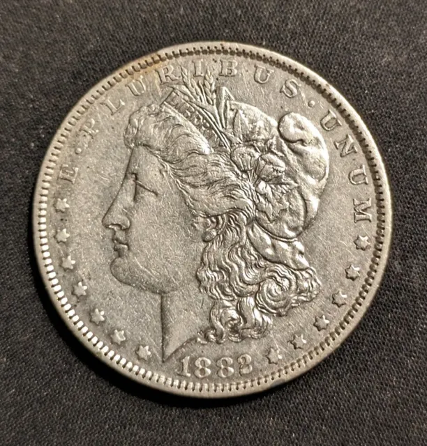 1882 O - Morgan Silver Dollar - 90% Silver Nice Coin - VF/XF (k)
