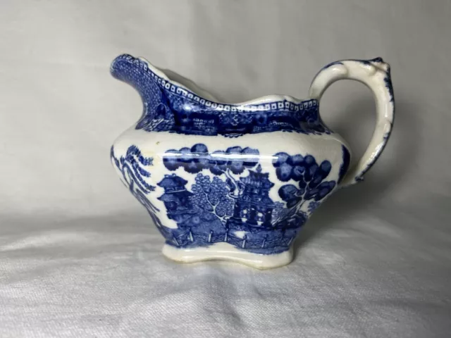https://www.picclickimg.com/txEAAOSwsz5kwpts/Antique-1918-Semi-Vitreous-Buffalo-Pottery-Blue-Willow-Gravy.webp