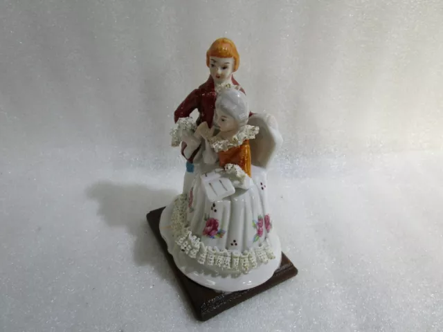 Vintage   Porcelain Man &  Lady  Figurine On Wooden Plinth
