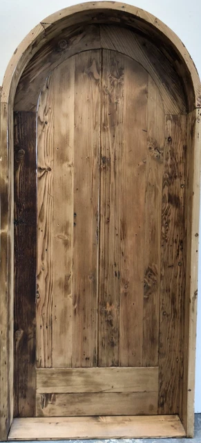 Rustic castle reclaimed lumber arched old growth Doug Fir solid door winery