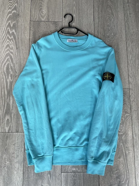 Light blue sales stone island jumper
