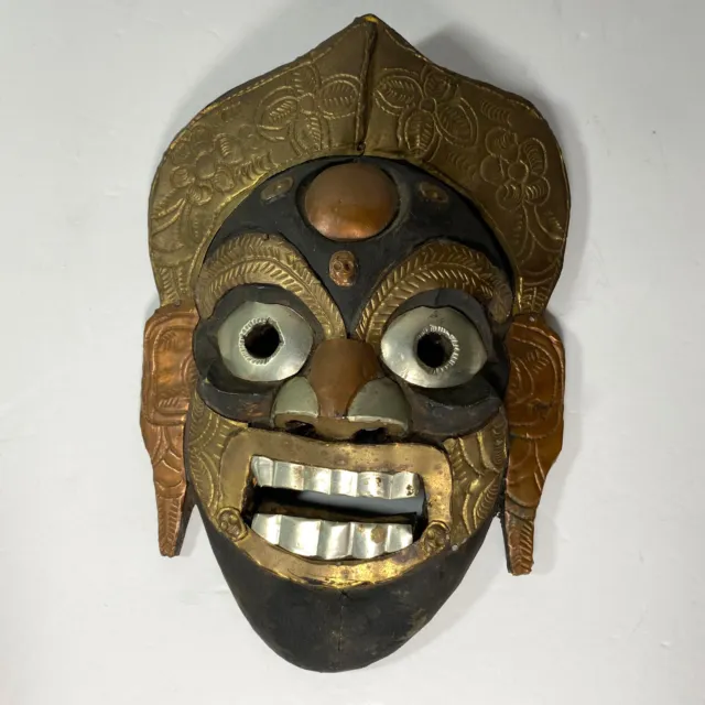 Antique handcarved wooden decorative mask
