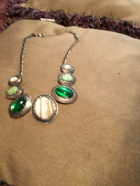 Charming Charlie’s choker style necklace with oval shaped stones