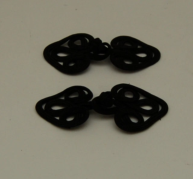 Alamari 2 coppie per giacche e cappotti colore nero