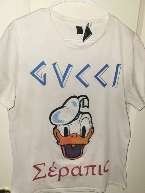 Gucci Donald Duck Pirate T-Shirt w/ Tags - White T-Shirts, Clothing -  GUC319740