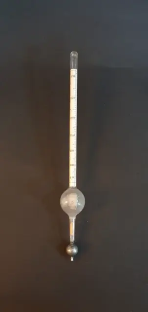 Antique Mercury spirit hydrometer by James How and antique graduated flask