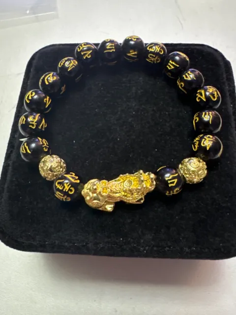 stunning black & gold chinese dragon charm beaded stretch bracelet