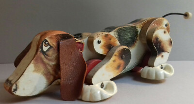 Fisher .FISHER PRICE VINTAGE CHIEN A TRAINER 