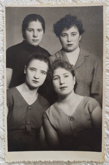 Vintage Photo. Portrait photo of four girls in the studio