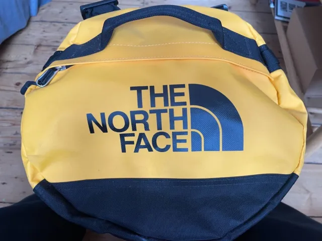The North Face Base Camp Duffel Bag Yellow -SMALL barely used.