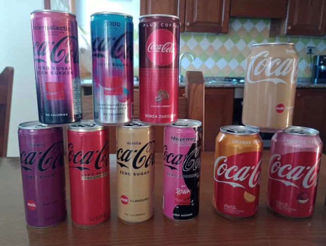 12 Coca Cola Lattine Vari Gusti Stati Vari  Bellissime Vuote