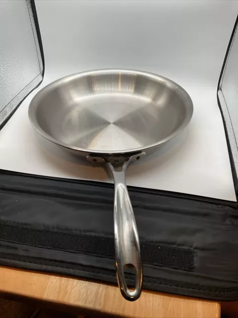 https://www.picclickimg.com/uCYAAOSw4mBlXT1x/Calphalon-Tri-Ply-1390-Stainless-Steel-Cookware.webp