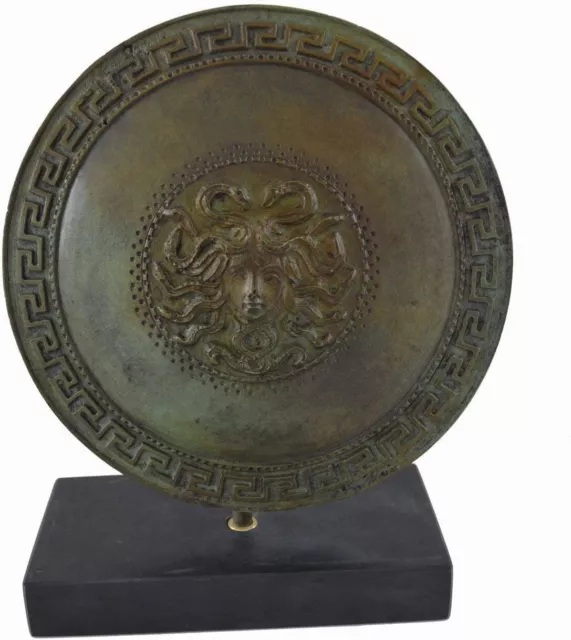 Ancient Greek small bronze shield with Gorgon Medusa head and meander design