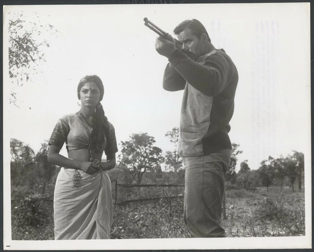 SONIA SAHANI CLINT WALKER in Maya '66 AIMING RIFLE