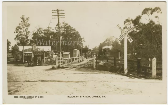 Real photo postcard of Upwey, Victoria with Railway Station & shops. C. 1920s.