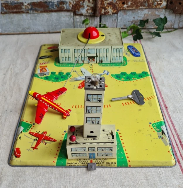 ANCIEN JOUET JOUSTRA en tôle aéroport avec avion looping 1950-1960 EUR 35,00 - FR